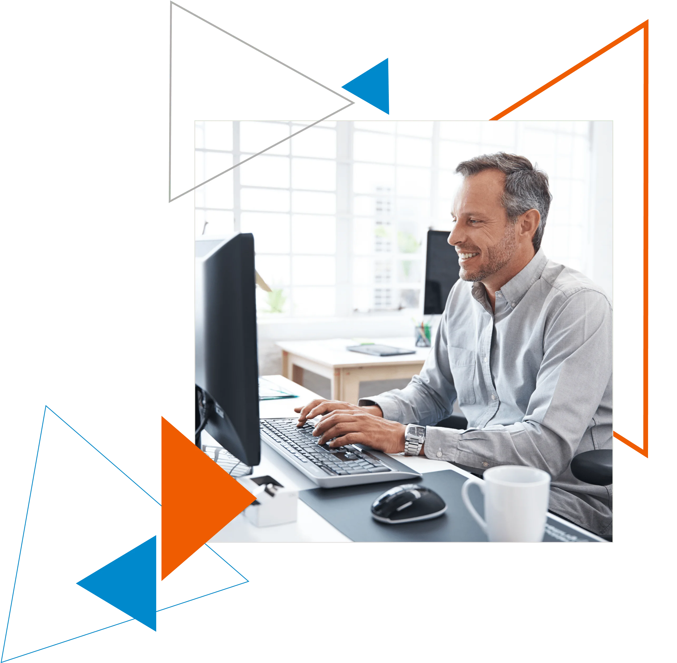 Man smiles while posting a job using his desktop computer